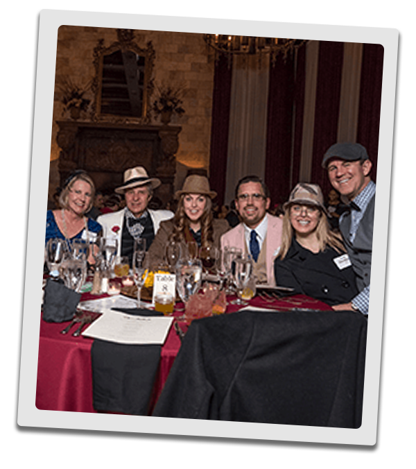 Denver Murder Mystery party guests at the table