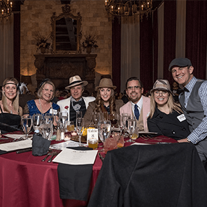 Denver Murder Mystery party guests at the table